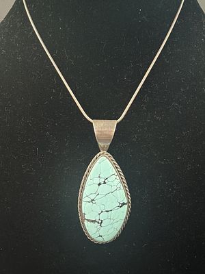 Sterling J King’s Desert Road Turquoise Pendant. With Sterling silver chain. Pendant measures 