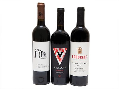 TR&Ecirc;S GARRAFAS DE VINHO TINTO DE MESA DO DOURO. Uma ( 1 ) garrafa de vinho tinto de mesa da 