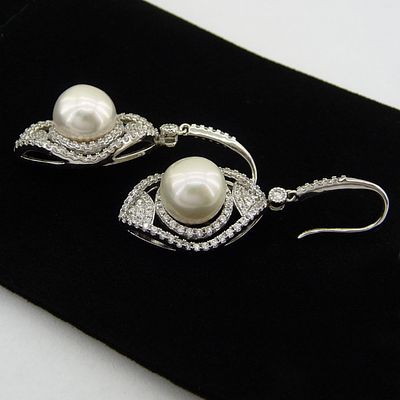 СЕРЕБРЯНЫЕ СЕРЬГИ С ЖЕМЧУГОМ ЭДИСОНА. Роскошные серьги выполнены из серебра с позолотой 18 