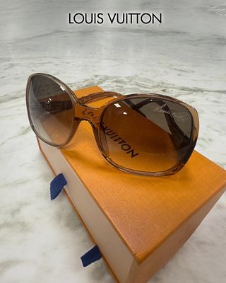 Очки LOUIS VUITTON Gina Sunglasses, модель в оттенке Light Glitter Honey с добавлением мелких 