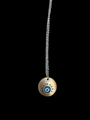 14K gold bracelet combined with an 18K gold pendant handmade by a designer in yellow gold and 