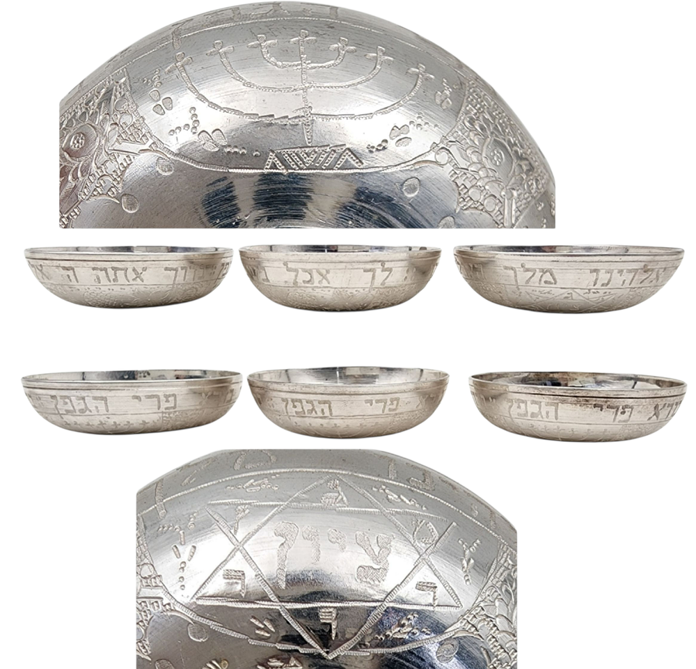 סט 6 כוסיות יין לשבת קודש וחגים כסף 84 פרס המאה - 20.
סט 6 כוסות יין לקידוש כסף 84 מעוטרות 