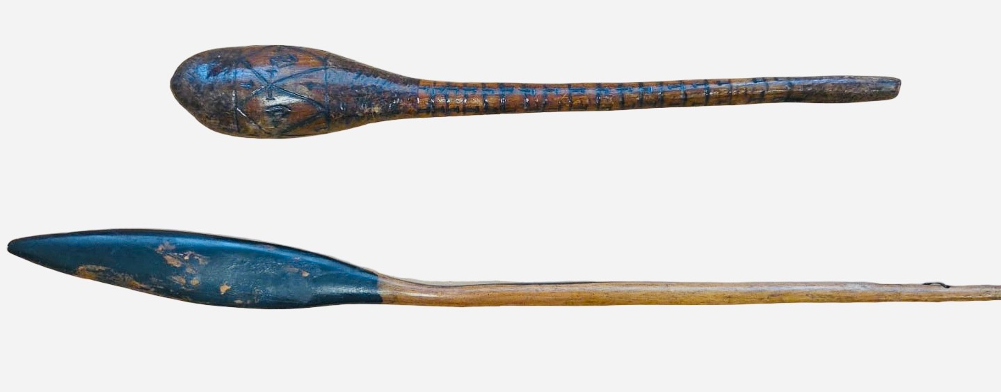 A pair of wooden clubs