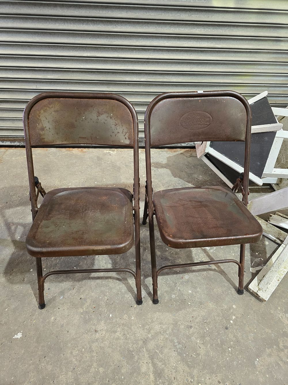 Lot 77: PAIR OF INDUSTRIAL METAL CHAIRS