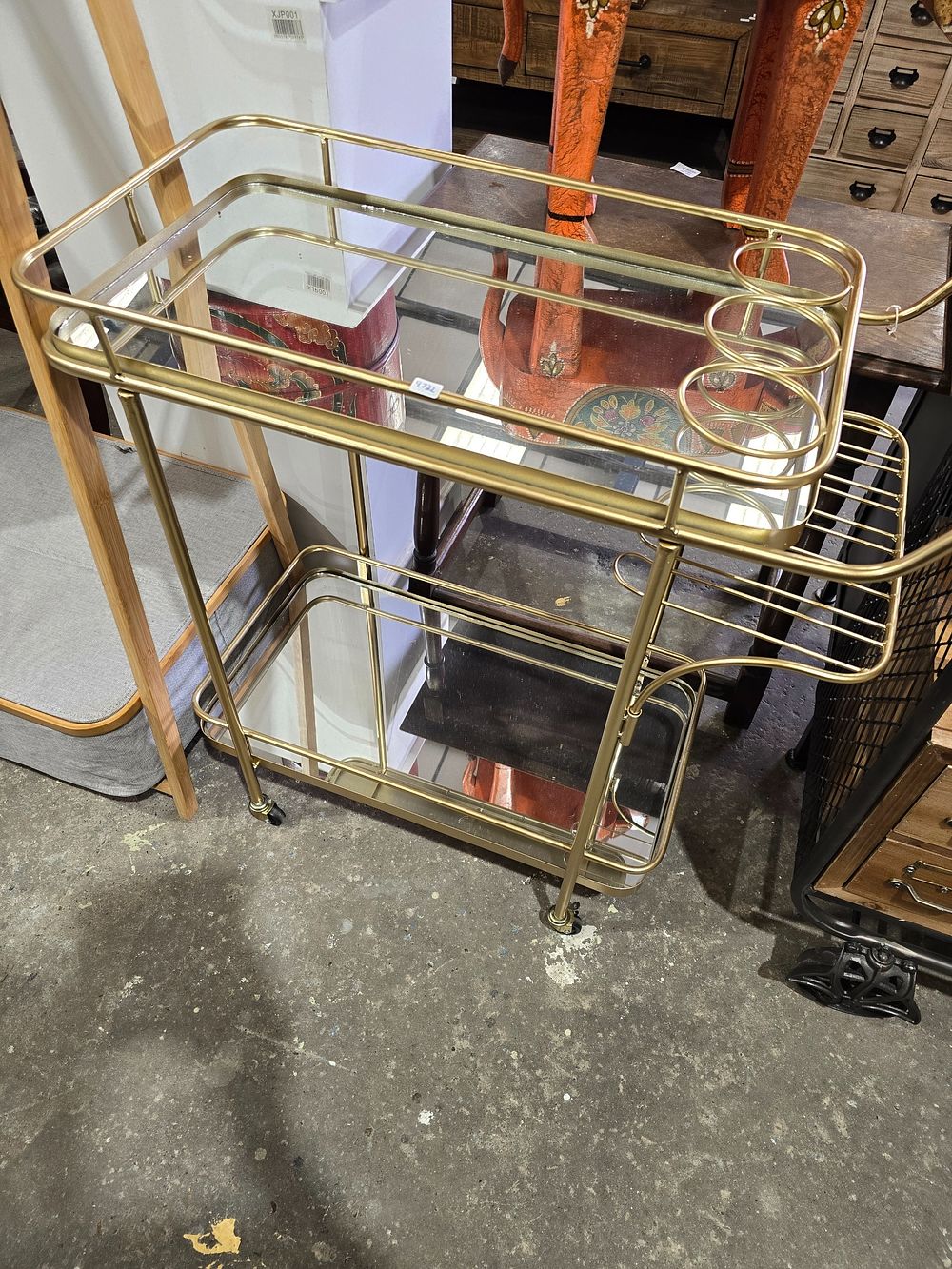 Lot 83: 1 X METAL AND GLASS TOPPED DRINKS CABINET
