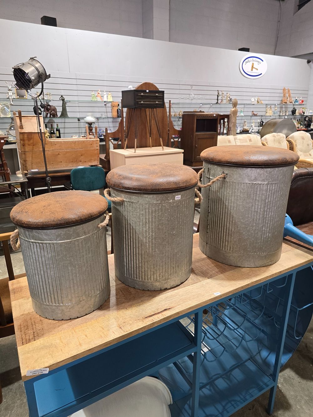 Lot 104: SET OF THREE METAL INDUSTRIAL STYLE STOOLS