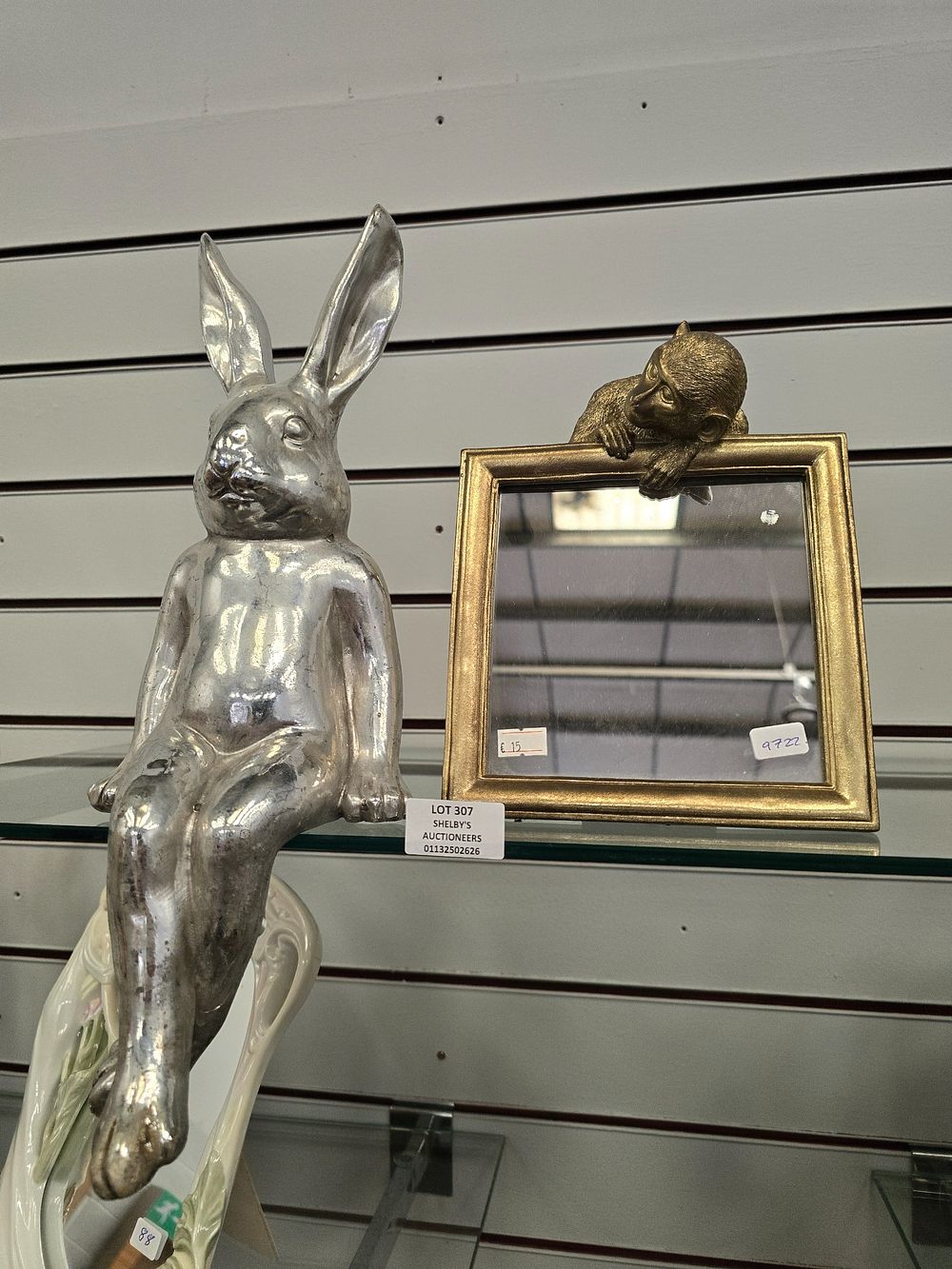 Lot 307: 1 X RABBIT SHELF SITTER WITH MONKEY PICTURE...