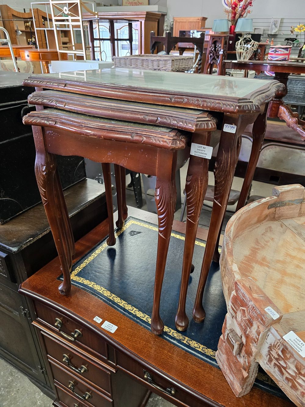 Lot 44: 1 X NEST OF LEATHER TOPPED TABLES