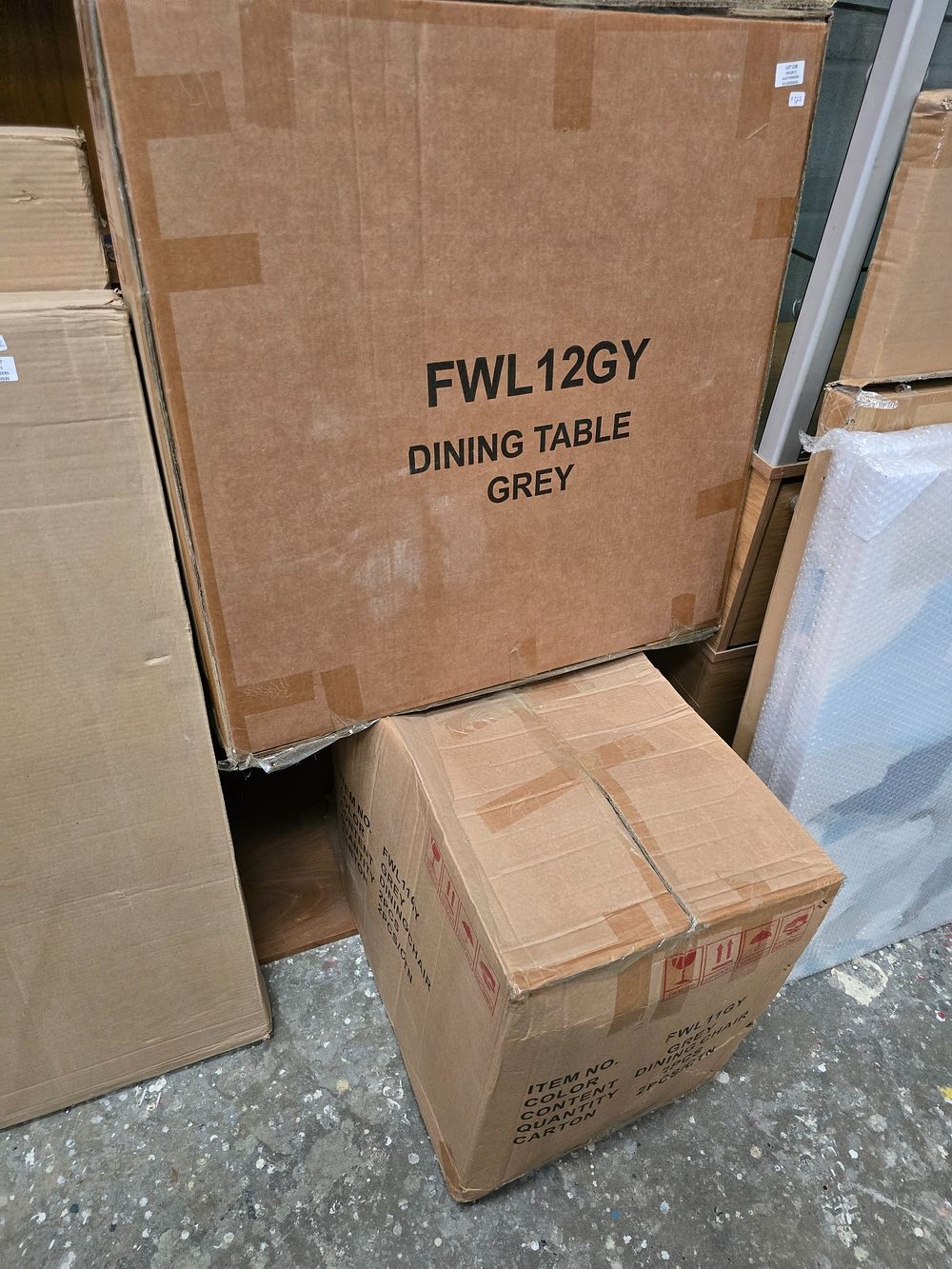 Lot 108: 1 X NEW IN PACKAGE GREY DINING TABLE...
