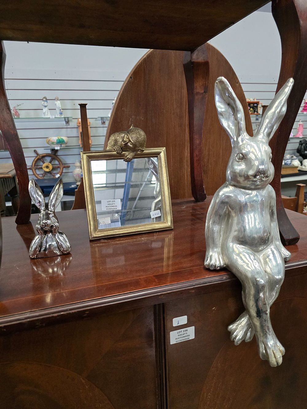 Lot 235: 1 X MONKEY SMALL MIRROR WITH SITTING SHELF...