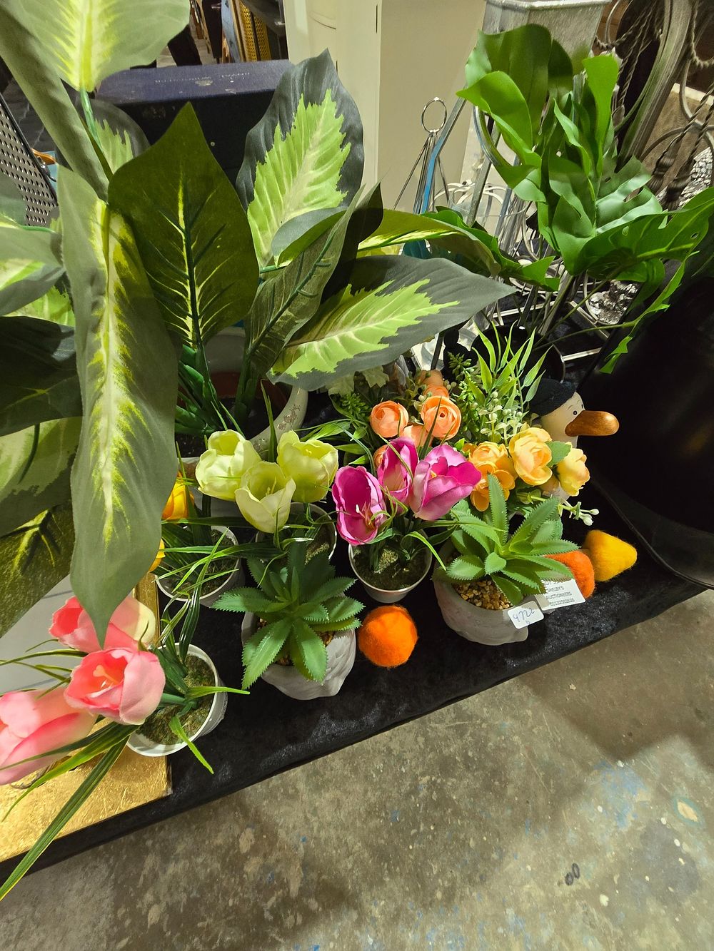 Lot 394: SELECTION OF ARTIFICIAL FLOWERS IN PLANT POTS ETC
