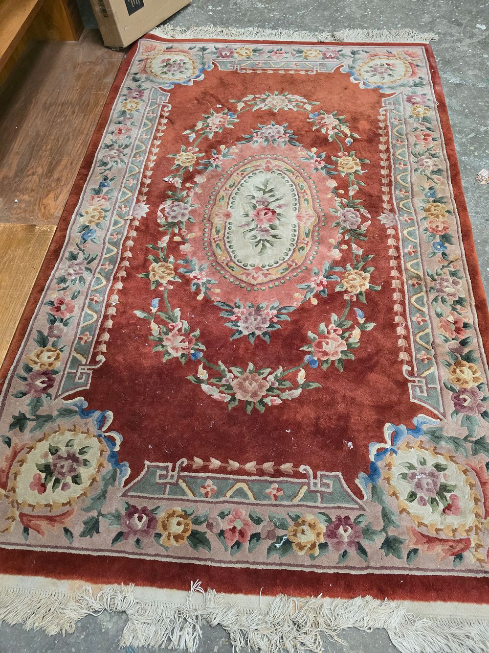 Lot 59: 1 X RED WOOLEN WOVEN FLOOR RUG