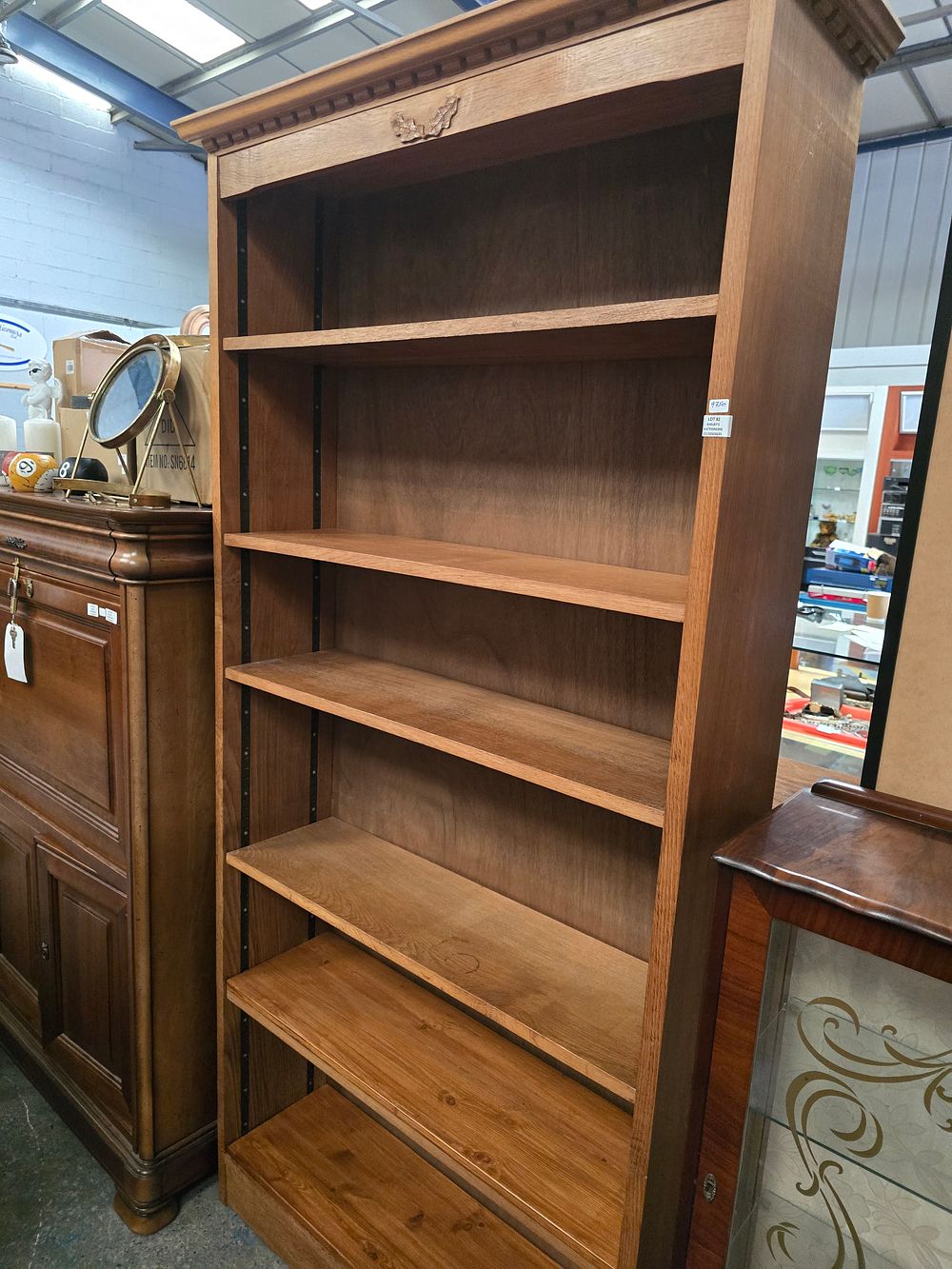 Lot 82: 1 X OAK 6 SHELF BOOKCASE