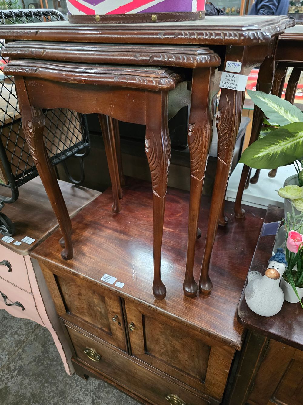 Lot 91: 1 X NEST OF LEATHER TOPPED TABLES