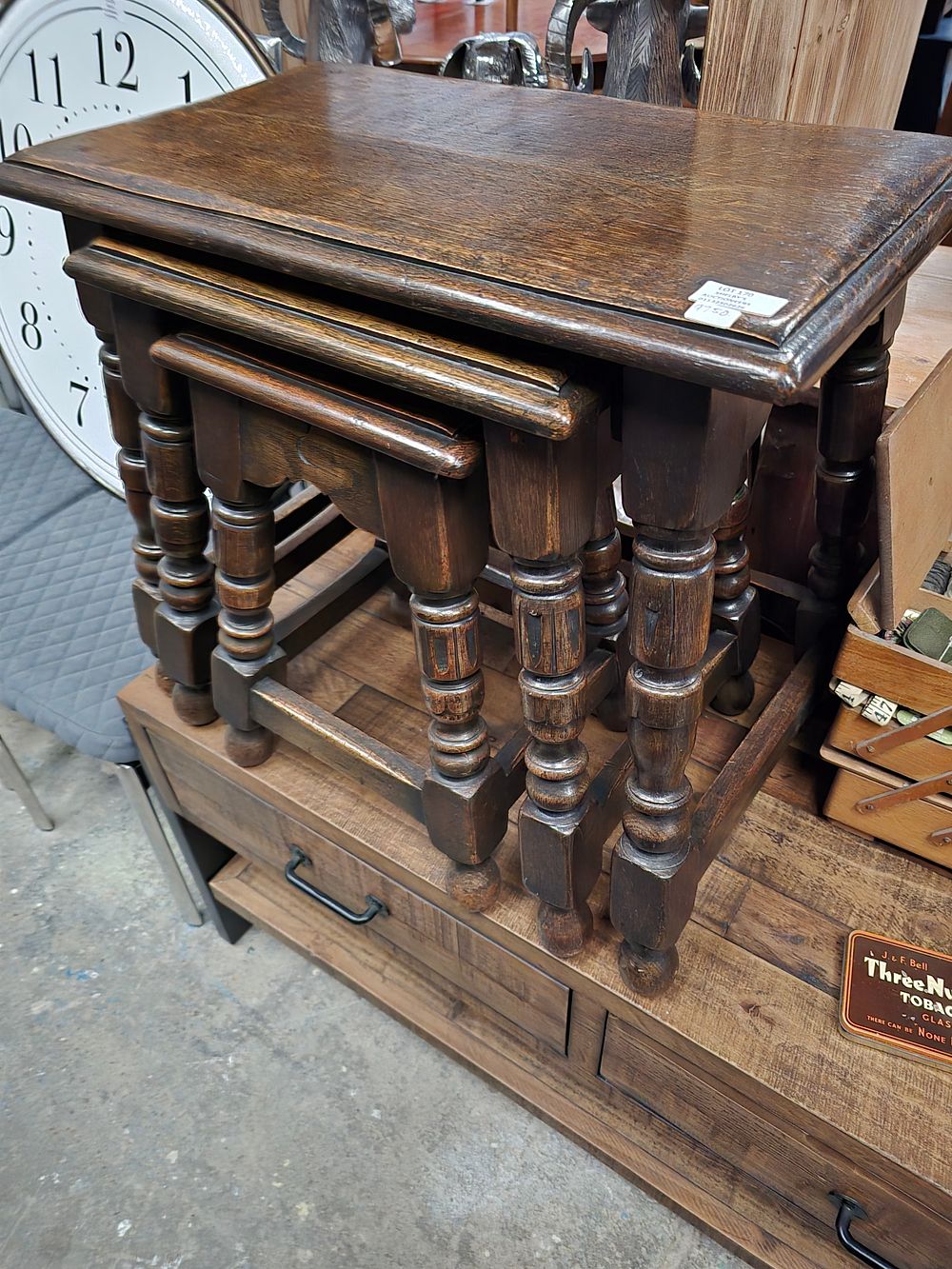 Lot 170: 1 X NEST OF DARK OAK TABLES