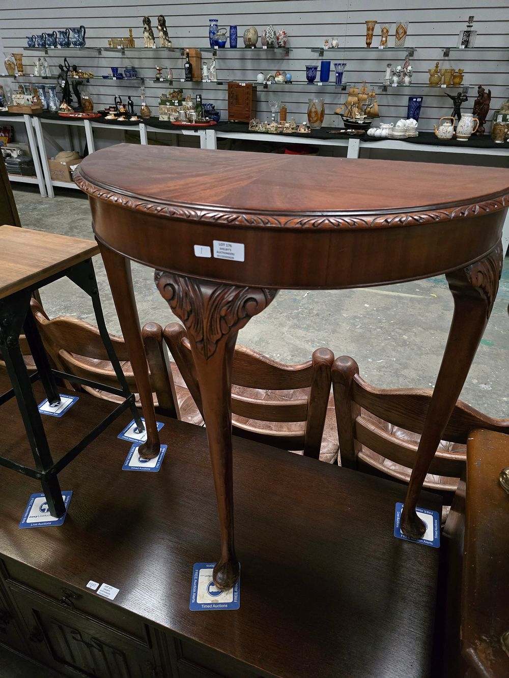 Lot 176: 1 X MAHOGANY HALF MOON HALL TABLE