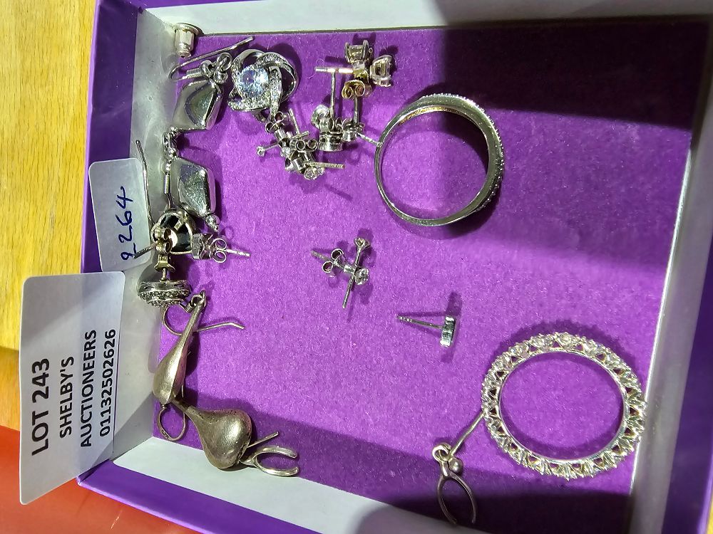 Lot 243: 2 X SILVER INSET RINGS WITH 10 PAIRS...