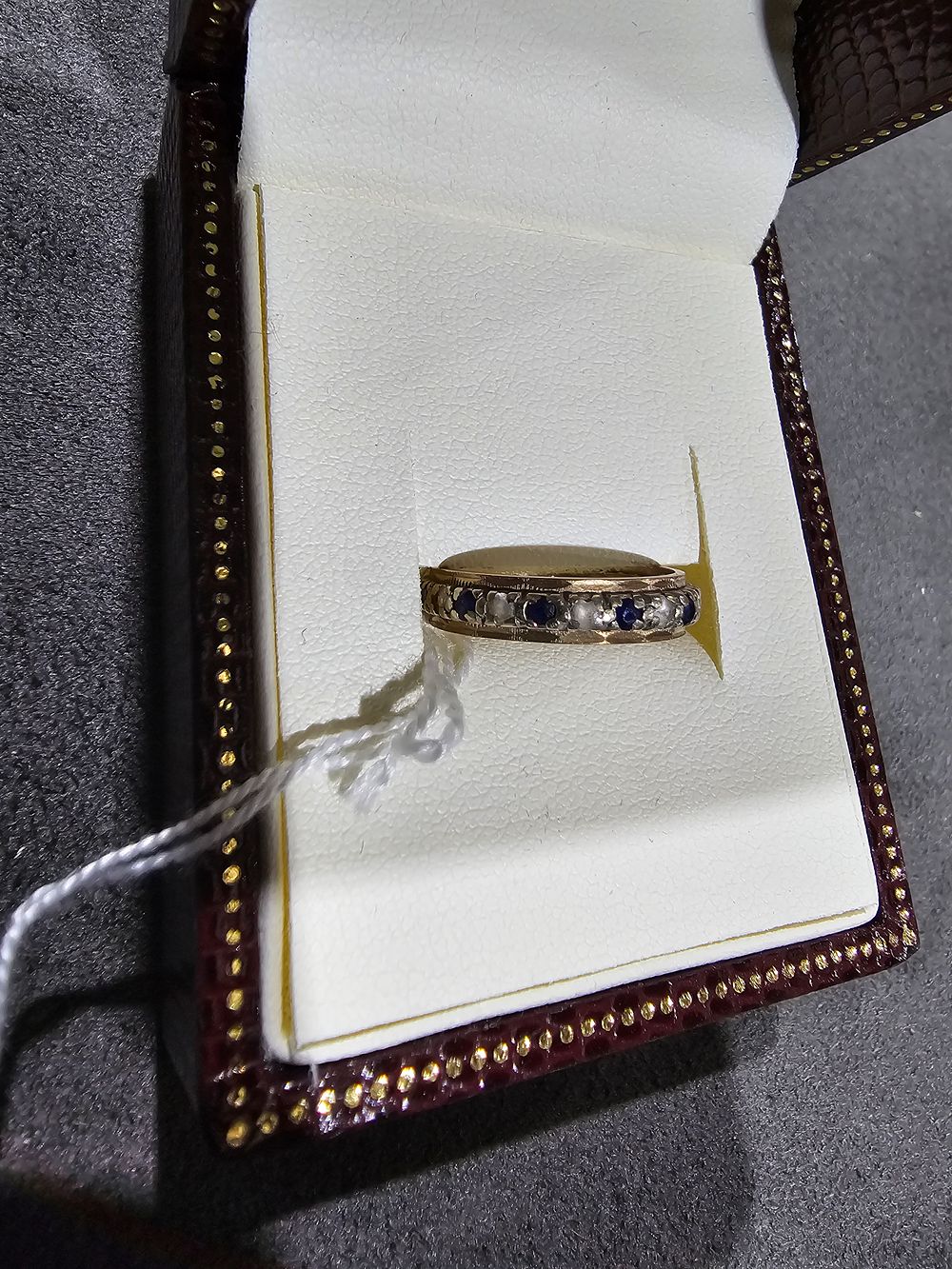 Lot 251: 1 X 9CT GOLD SAPHIRE SET ETERNITY RING