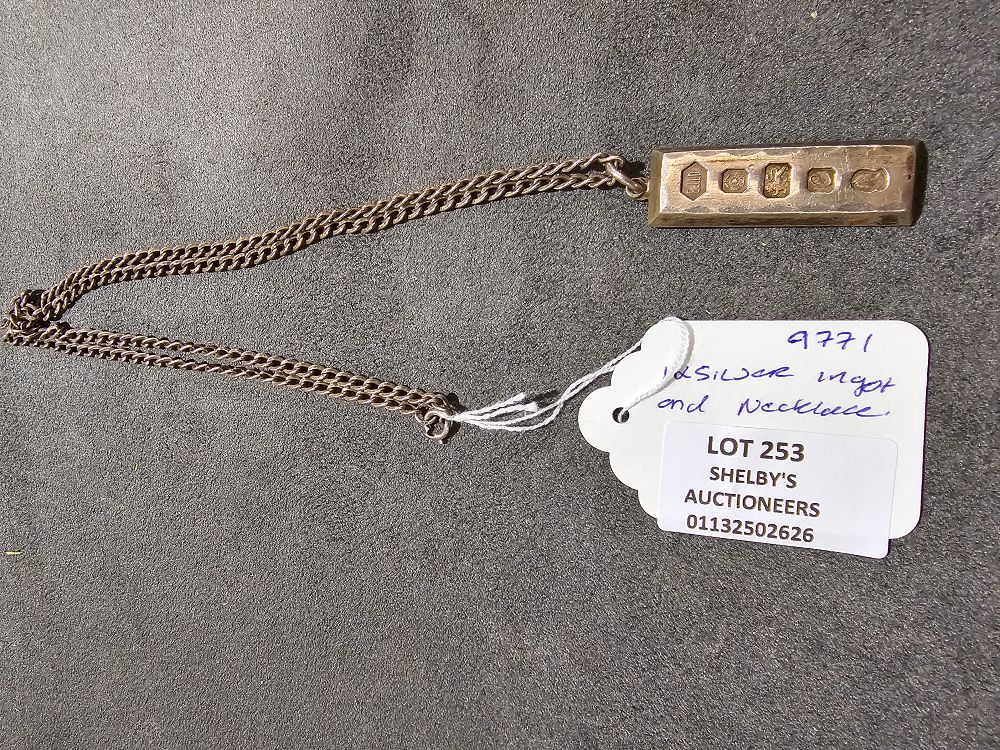 Lot 253: 1 X SILVER INGOT WITH SILVER NECKLACE ELJD...
