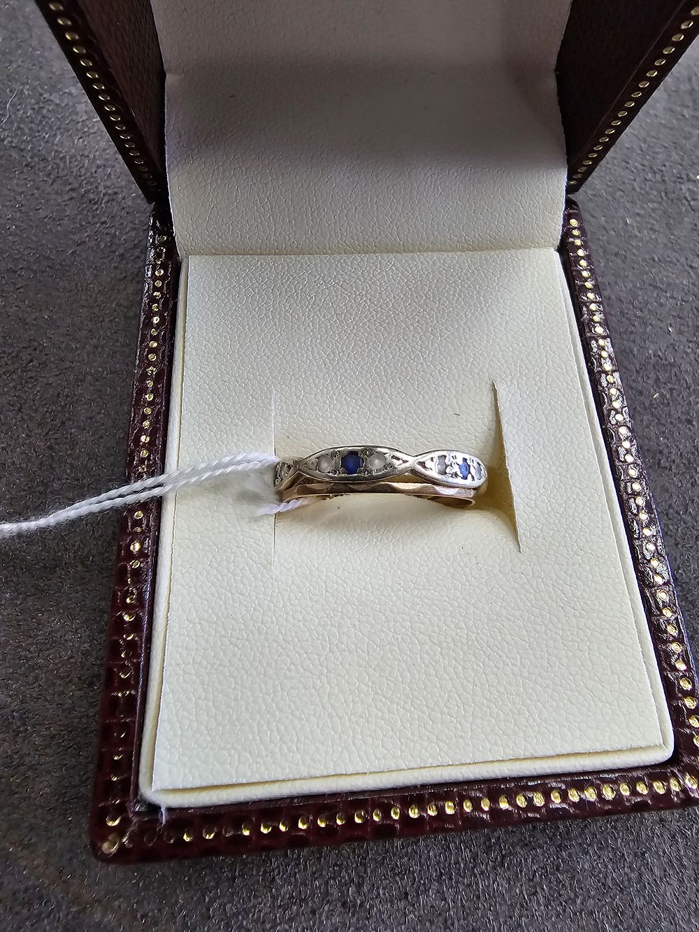Lot 285: 1 X 9CT GOLD SAPHIRE SET ETERNITY RING