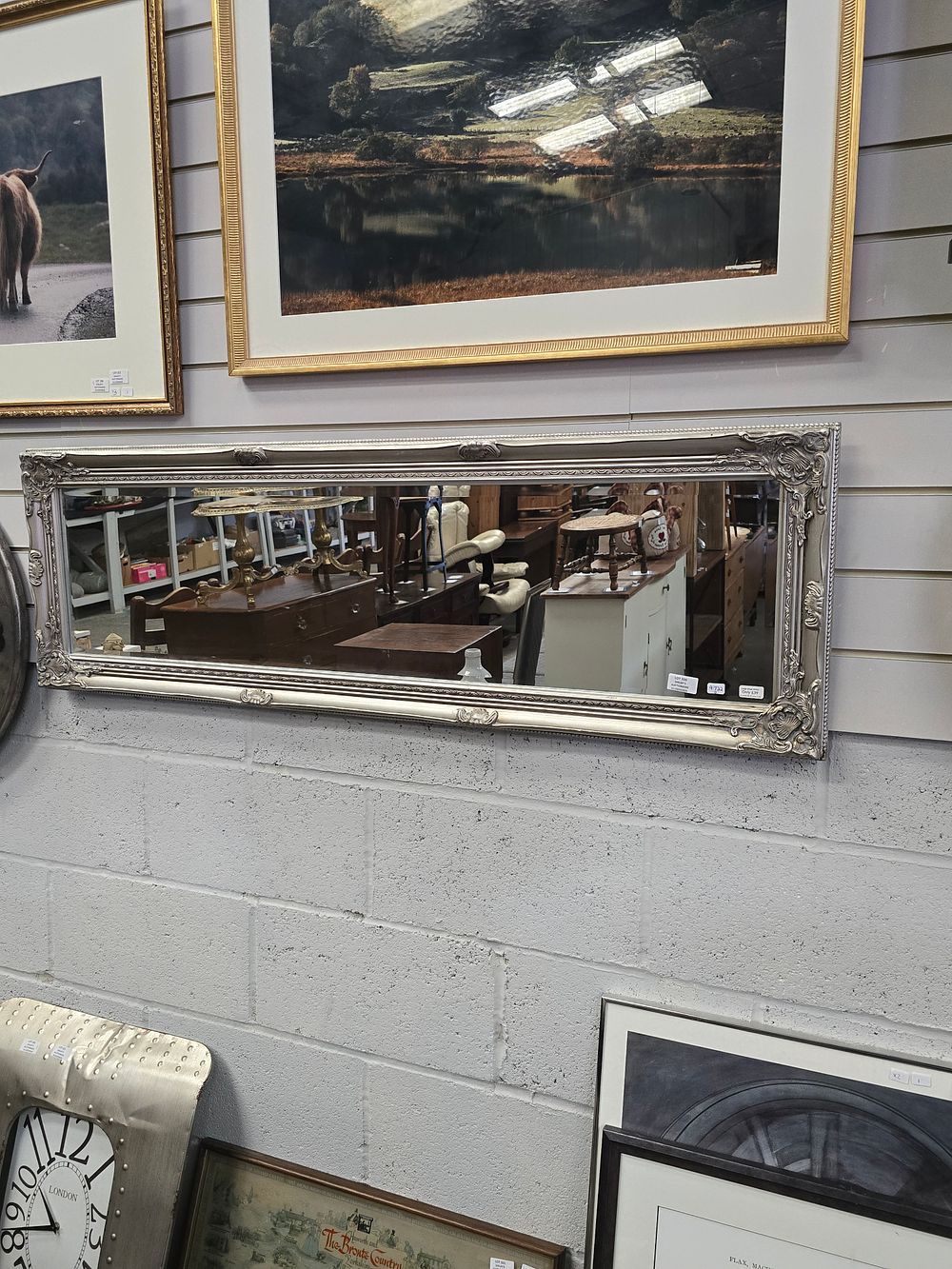 Lot 320: 1 X LARGE SILVER COLOUR LONG WALL MIRROR...