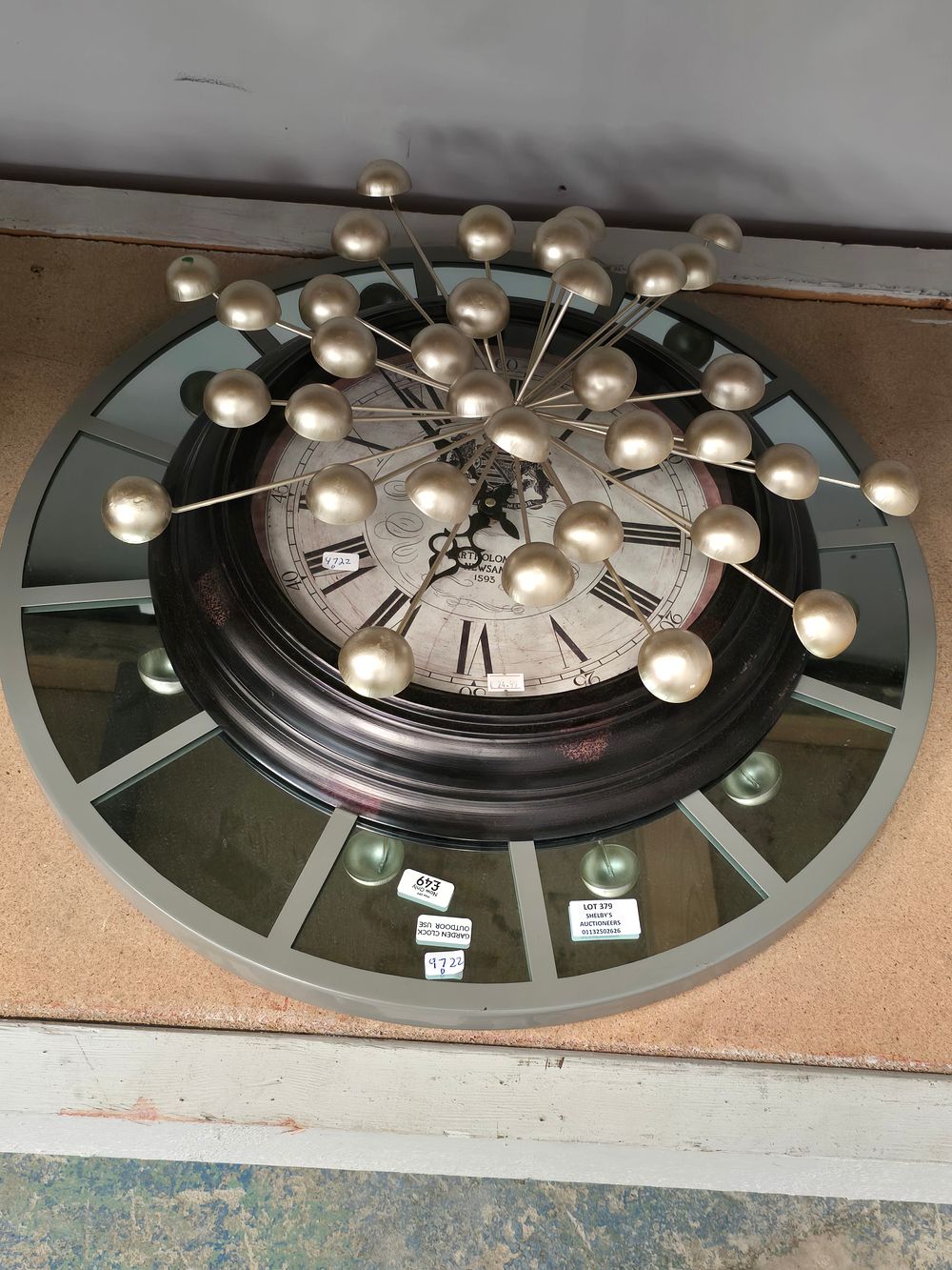 Lot 379: 2 X NEW WALL CLOCKS WITH METAL WALL...