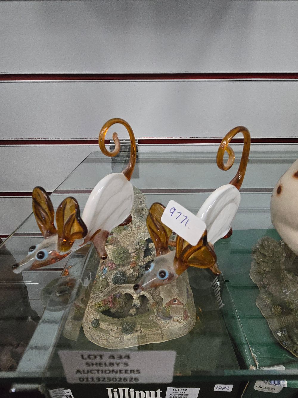Lot 434: 2 X AMBER GLASS MOUSE FIGURES