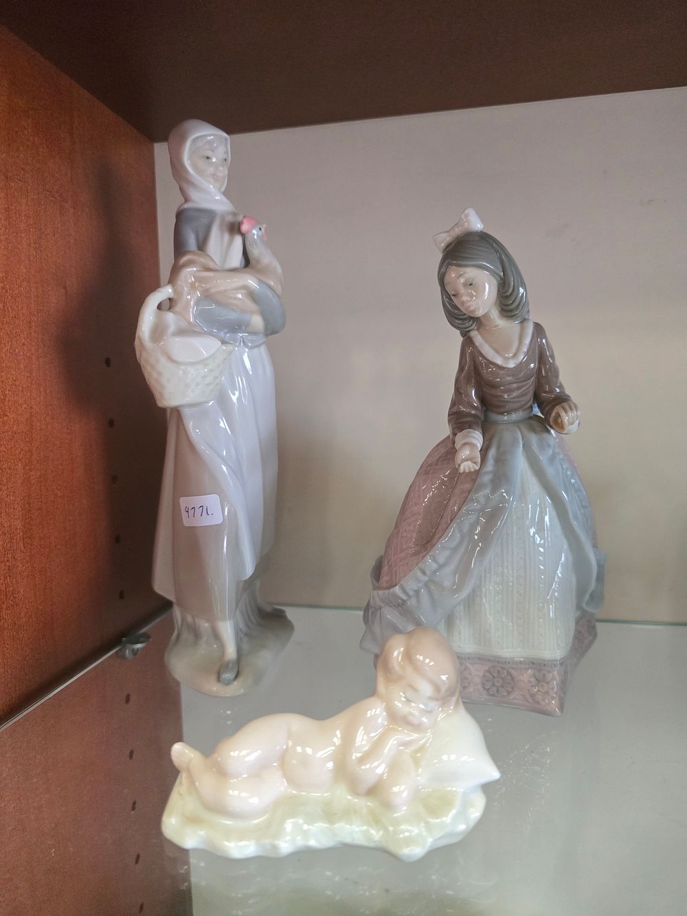 Lot 530: 3 X LLADRO FIGURINES HOLDING CHICKEN BABY LAYING...