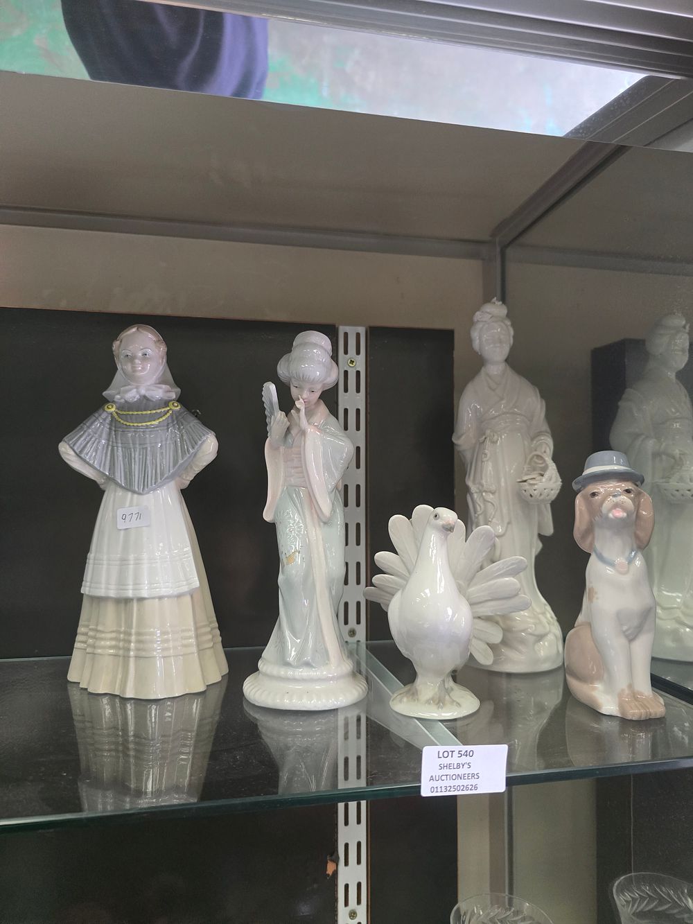 Lot 540: 5 X VARIOUS POTTERY FIGURINES LADIES SWAN ETC