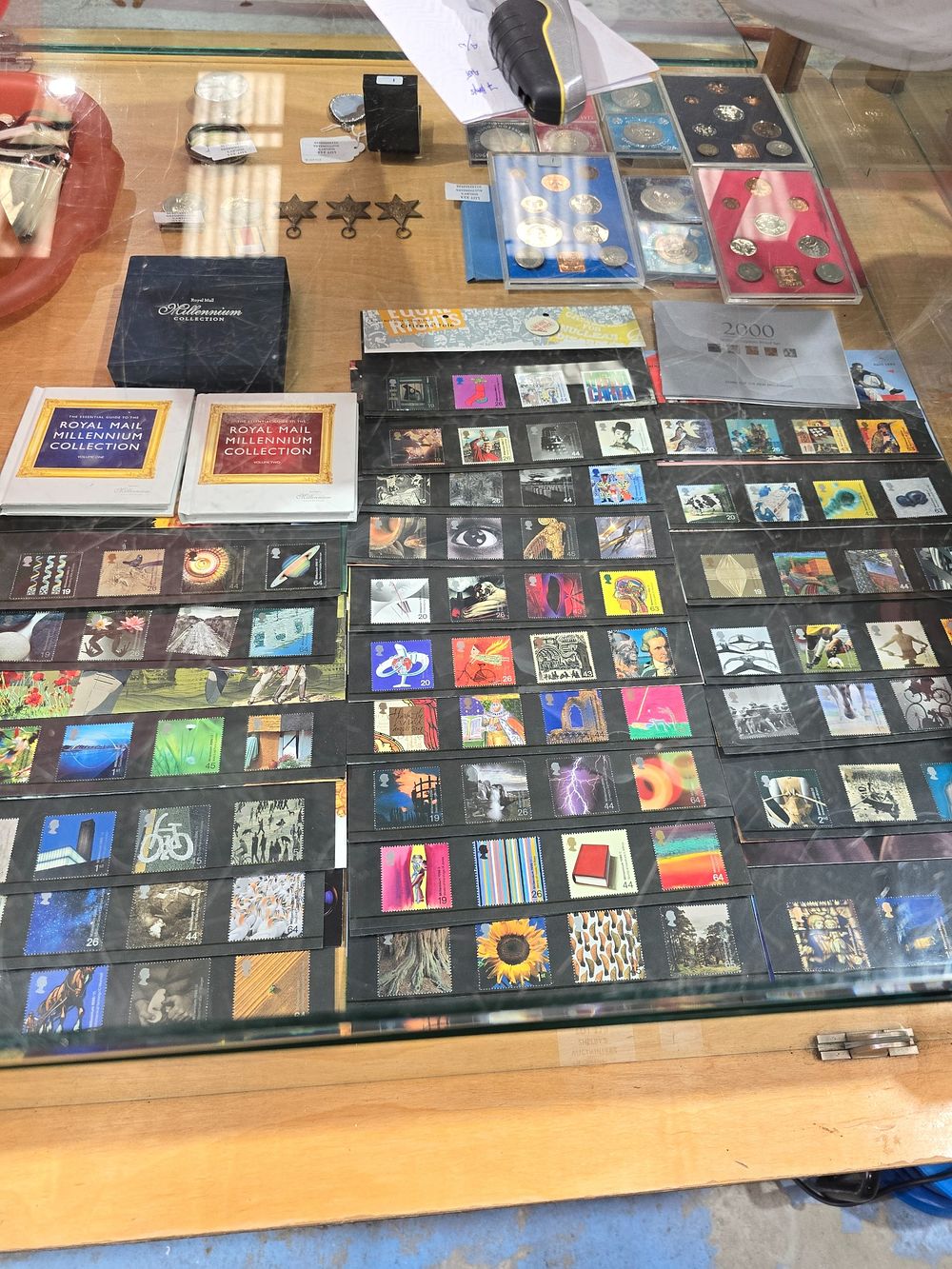 Lot 179: ROYAL MAIL MILLENIUIM STAMP COLLECTION WITH BOOKS
