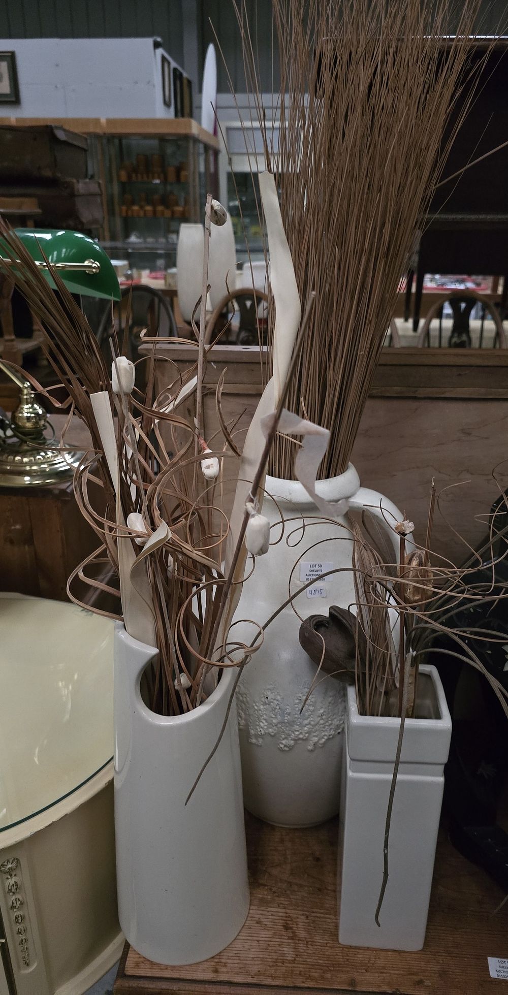 Lot 50: 1 X LARGE JUG WITH VASES