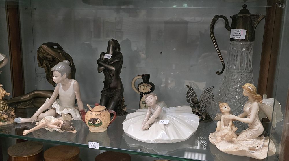 Lot 165A: SELECTION OF NAO POTTERY FIGURINES WITH WINE DECANTER...