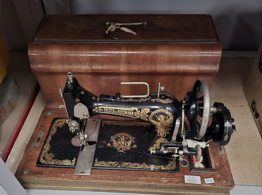 Lot 215: 1 X FRISTER AND ROSSMAN HAND POWERED SEWING...