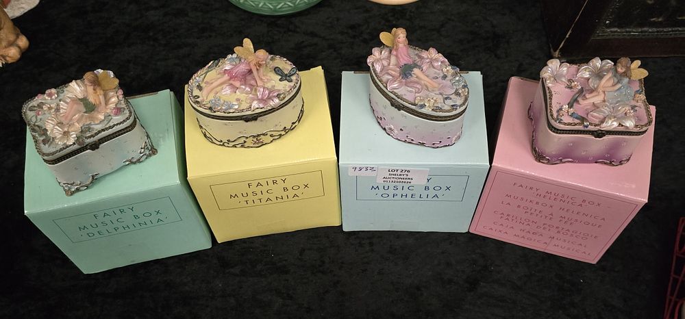 Lot 276: 4 X AVON BOXED FAIRY MUSIC BOXES
