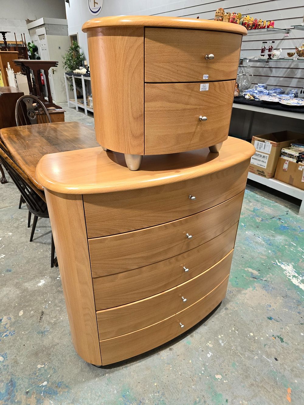 Lot 17: 1 X 5 DRAWER BOW FRONT BEECH EFFECT...