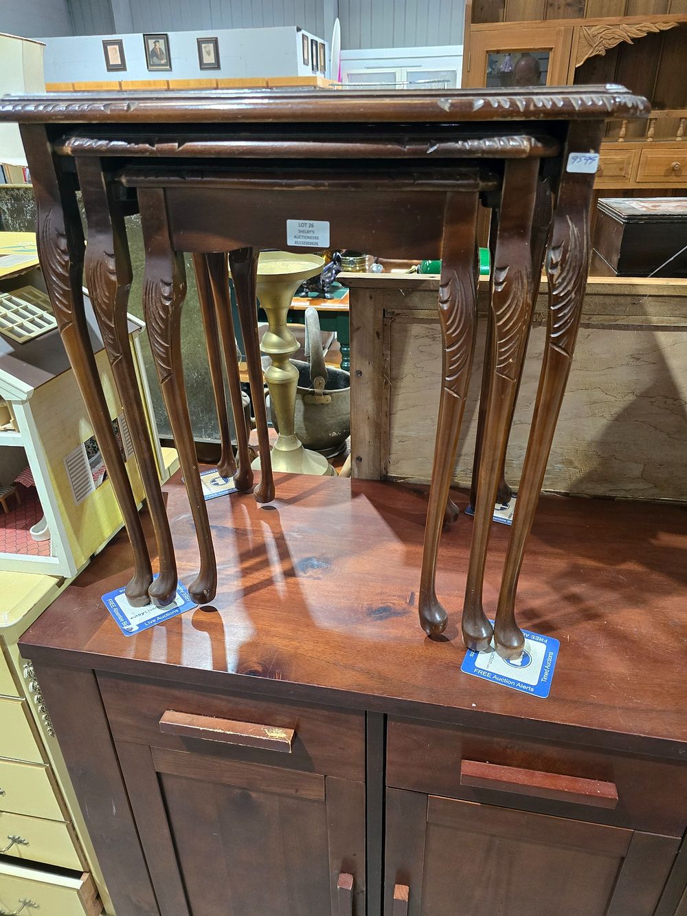 Lot 26: NEST OF LEATHER TOPPED TABLES