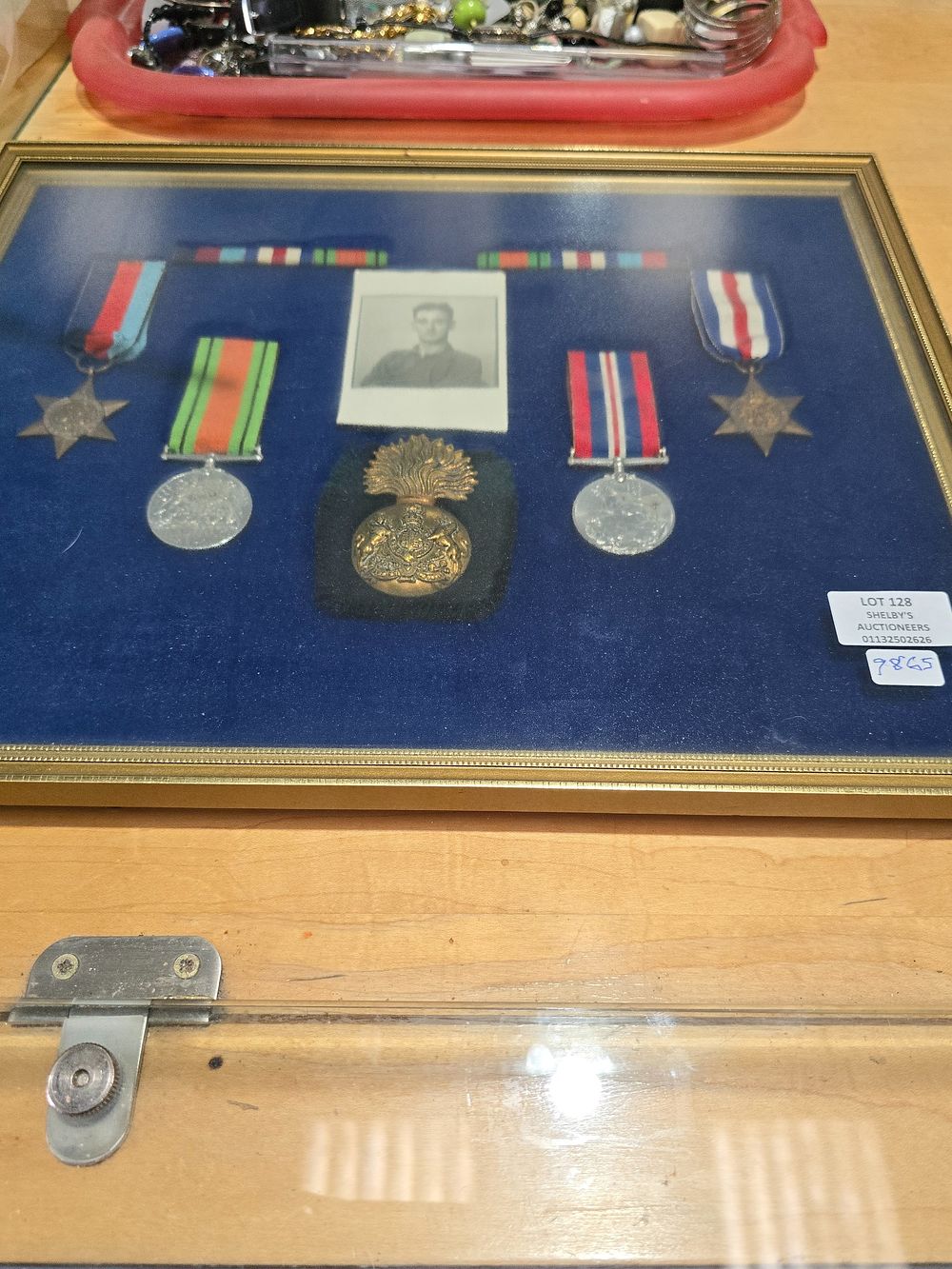Lot 128: SET OF FOUR WW2 MEDALS IN A FRAME...