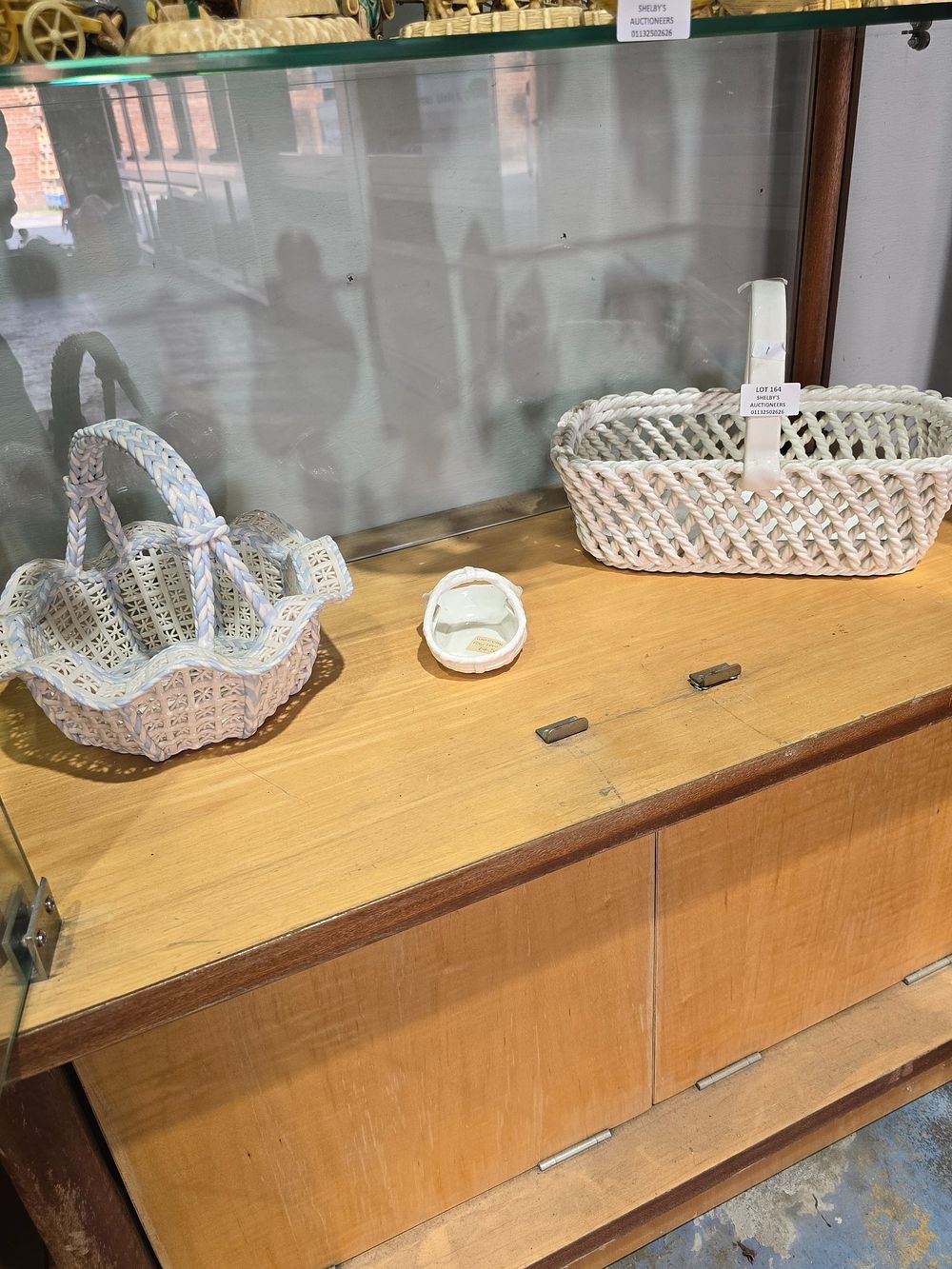 Lot 164: 2 X LARGE POTTERY FRUIT BASKETS WITH SMALL...