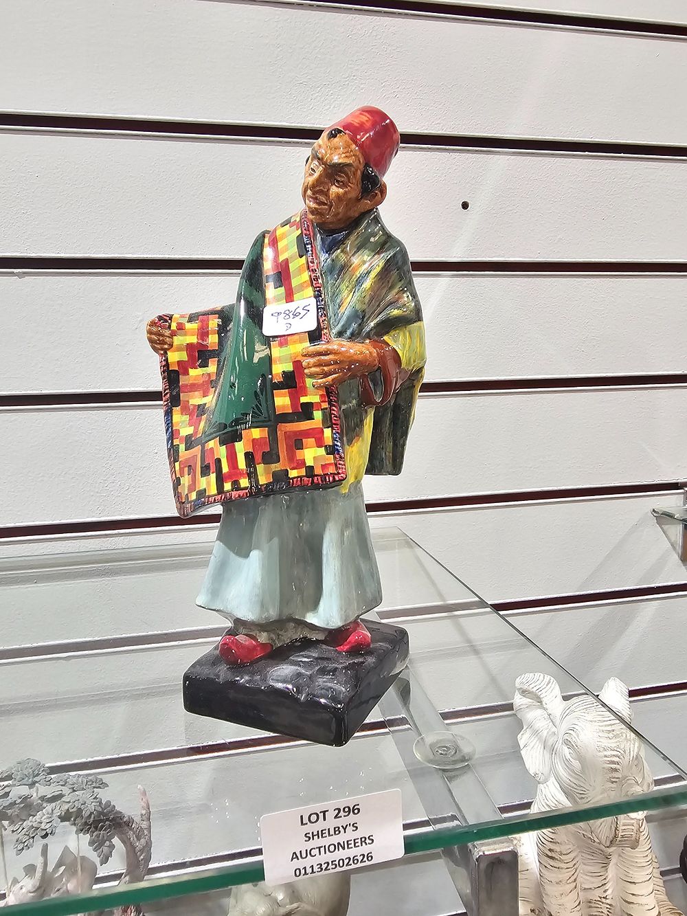 Lot 296: 1 X ROYAL DOULDON CARPET SELLER FIGURINE
