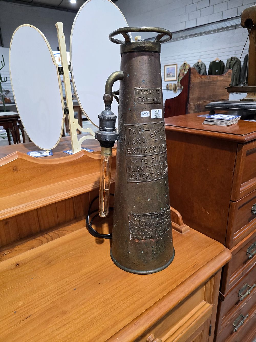 Lot 67: 1 X THE LANG BRIDGE FIRE EXTINGUISHER LAMP