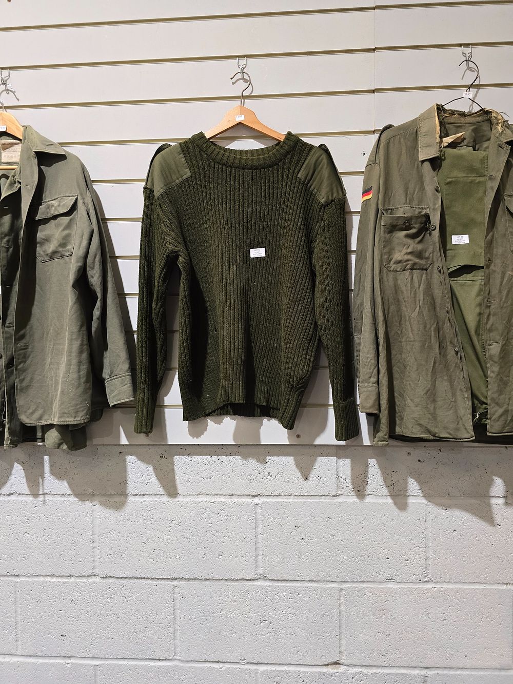 Lot 92: 1 X ARMY EDITION GREEN WOOLEN JUMPER DOES...