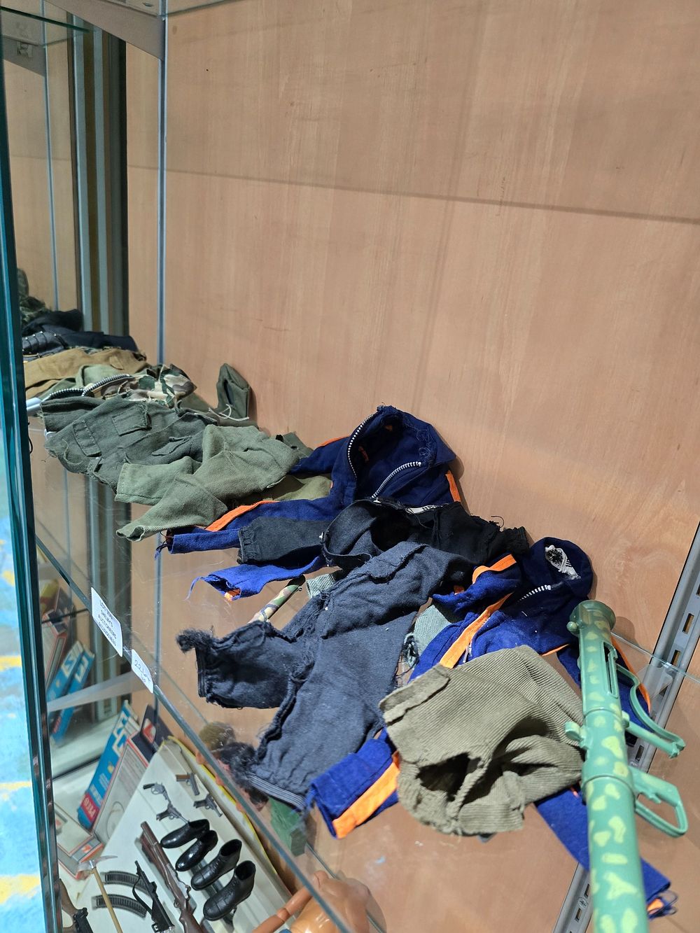 Lot 159: SELECTION OF ACTION MAN FIGURE CLOTHING WITH GUNS...