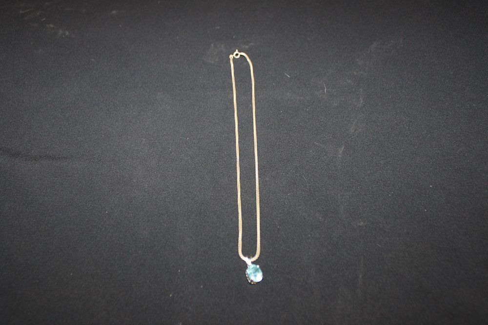 Lot 261: 1 X SILVER AND TOPAZ INSET PENDANT WITH...