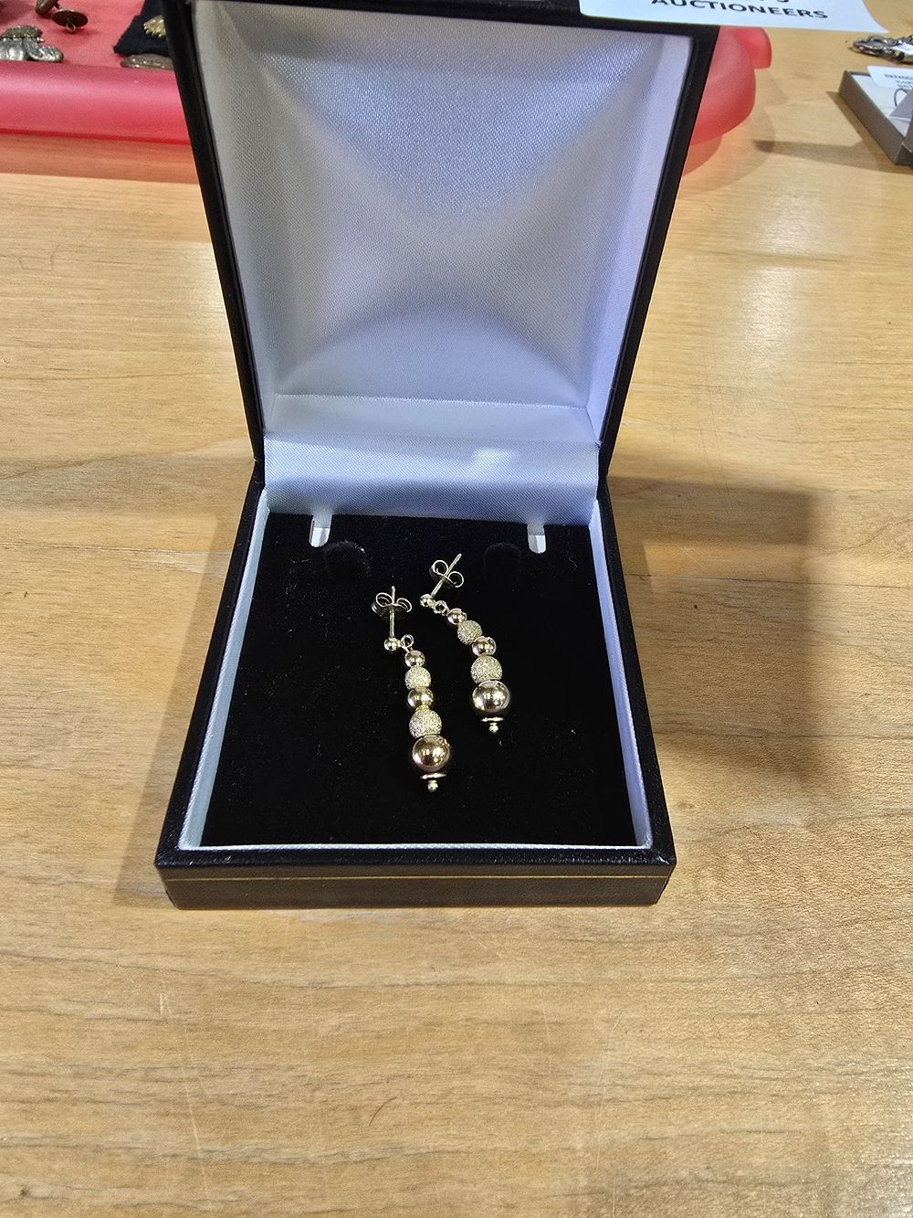 Lot 194: 1 X PAIR OF 9CT GOLD BALL DROP...