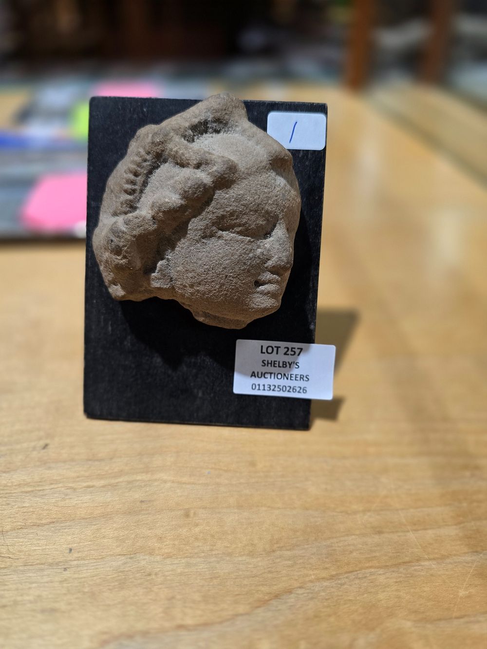 Lot 257: 1 X SMALL STONE ROMAN HEAD BUST