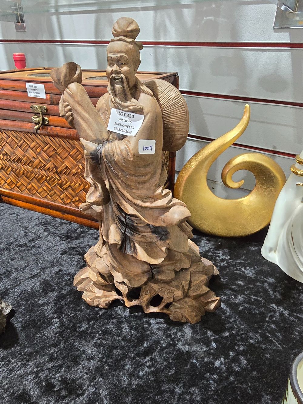 Lot 324: 1 X WOODEN ORIENTAL FIGURINE