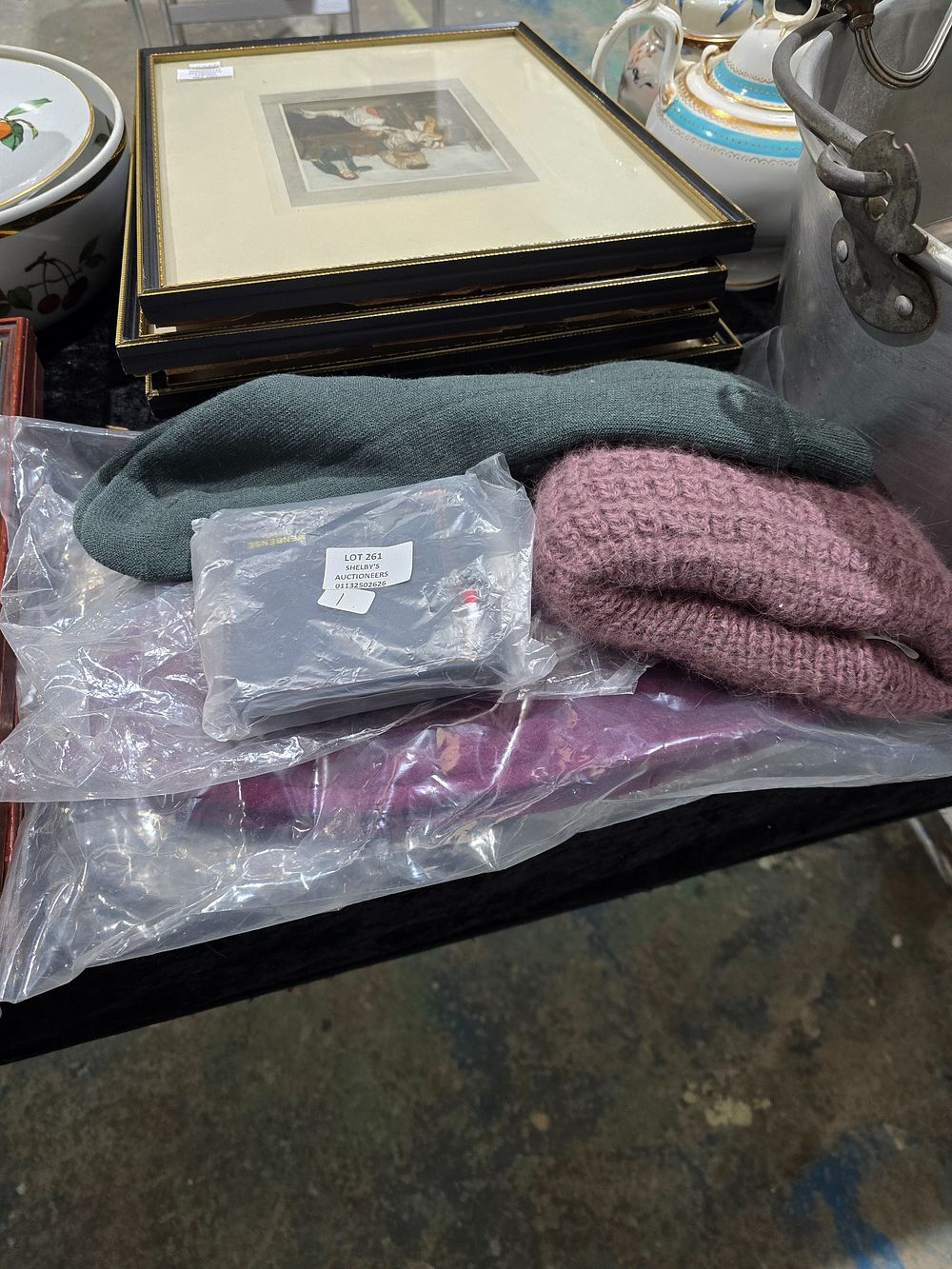 Lot 261: SELECTION OF WOLLEY SOCKS WITH HAT WALLET ETC
