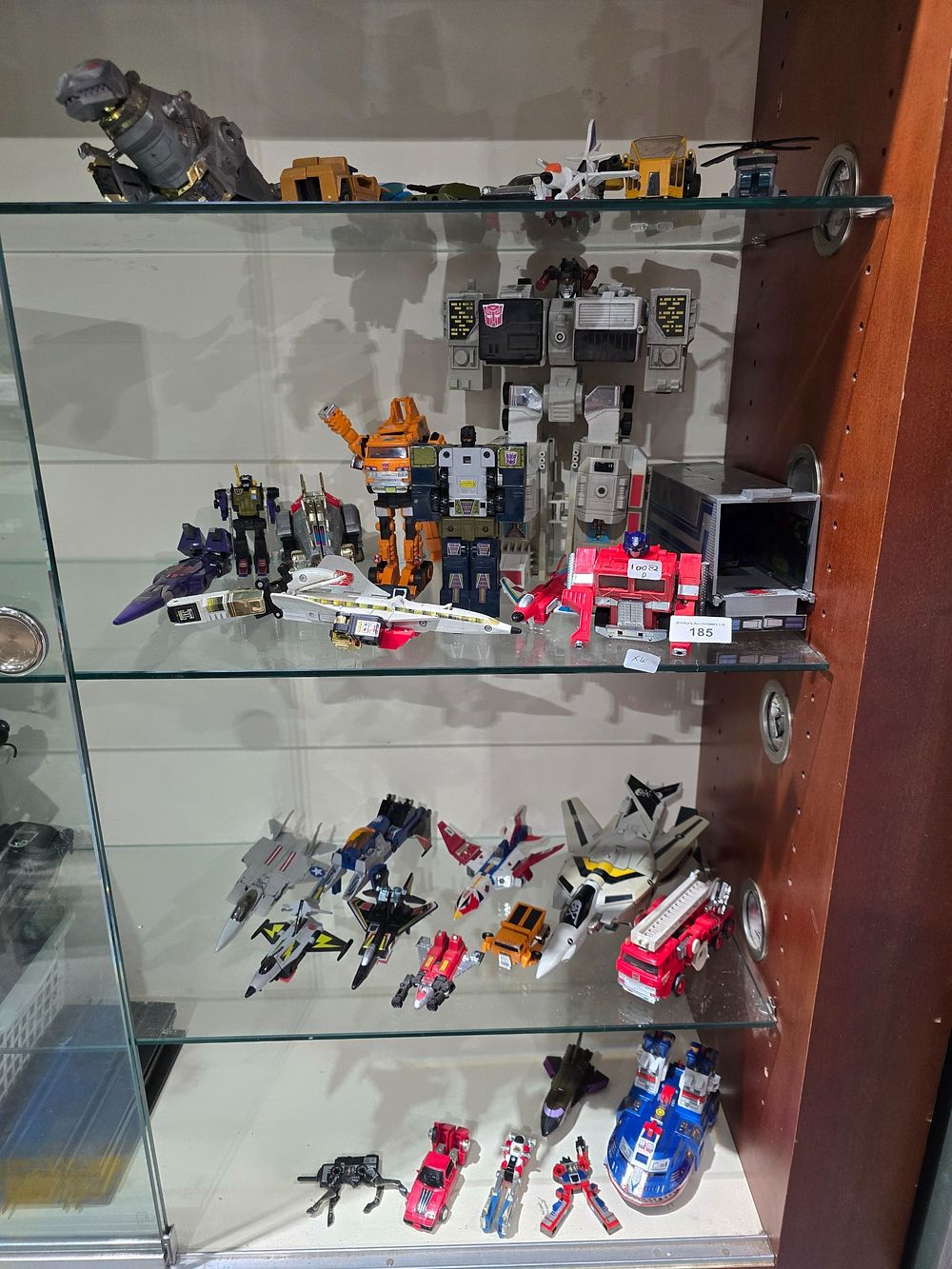 Lot 185: 4 X VARIOUS SHELVES CONTAINING TRANSFORMER FIGURES ETC