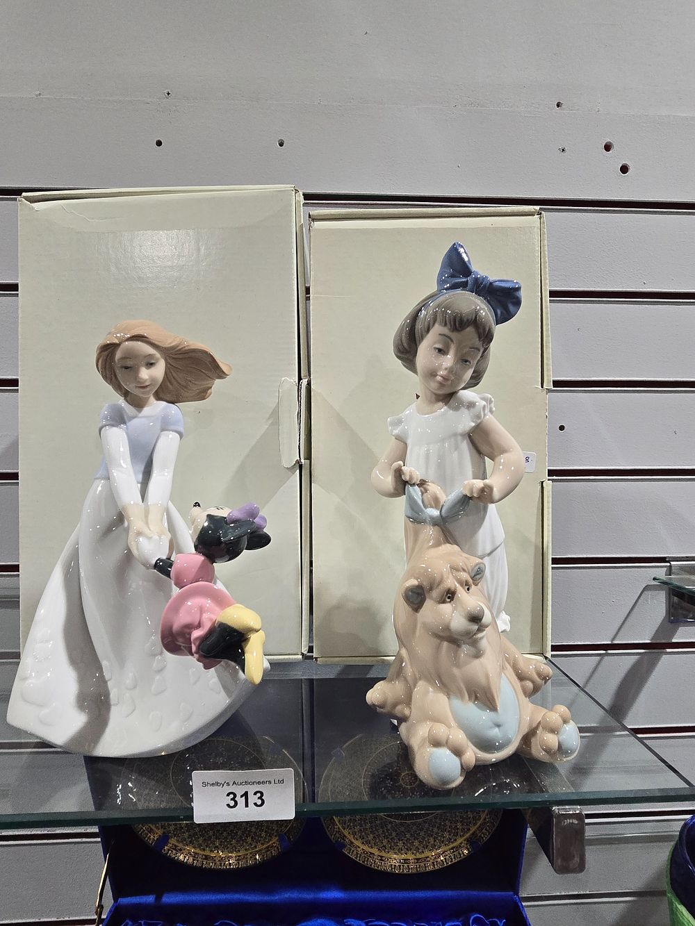 Lot 313: 2 X NAO POTTERY FIGURINES DISNEY FRIENDS WITH...