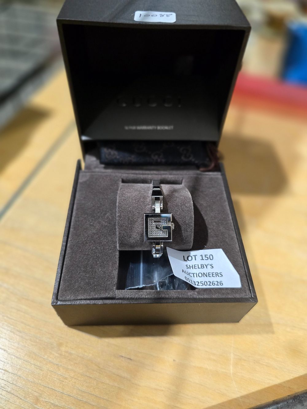 Lot 150: 1 X LADIES GUCCI WATCH WITH BOX AND...